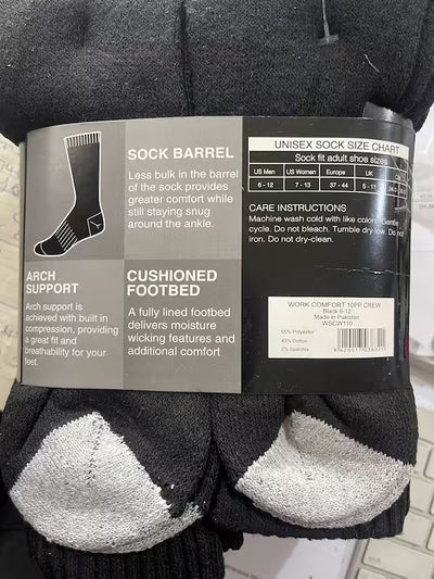 Black socks with a visible label on a textured surface