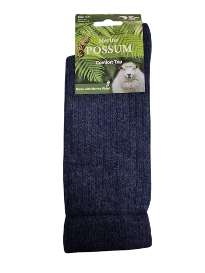 Dark blue socks with a Merino Possum label on a white background