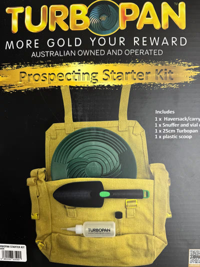 Turbopan prospecting starter kit with yellow bag, pan, shovel, and vial on a black background
