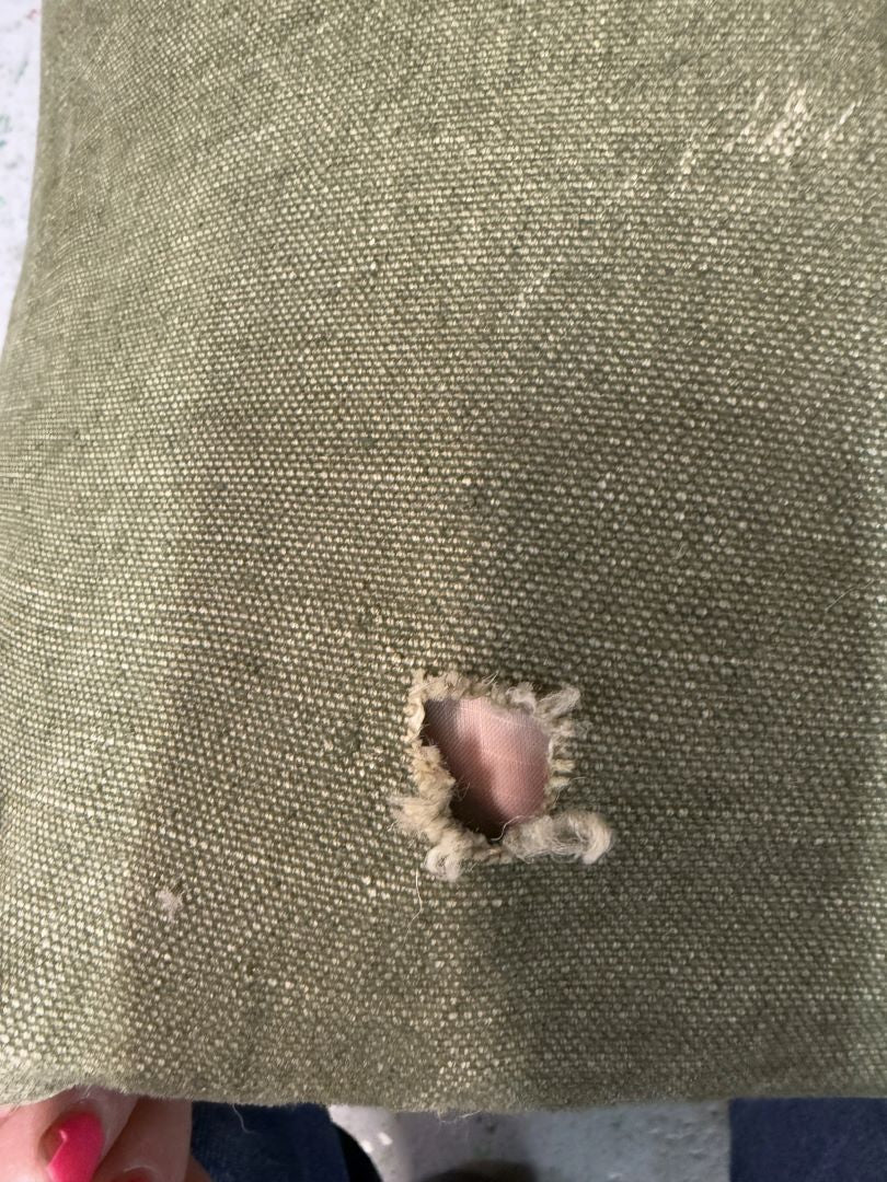 Textured fabric with a hole and decorative trim