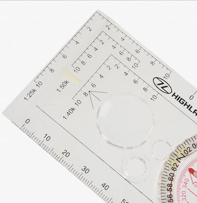 Optical instrument with measurement scales on a white background