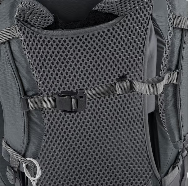 Close-up of a gray backpack with mesh padding and straps