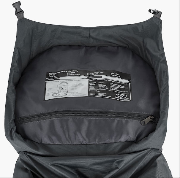 Black backpack with a label on a white background
