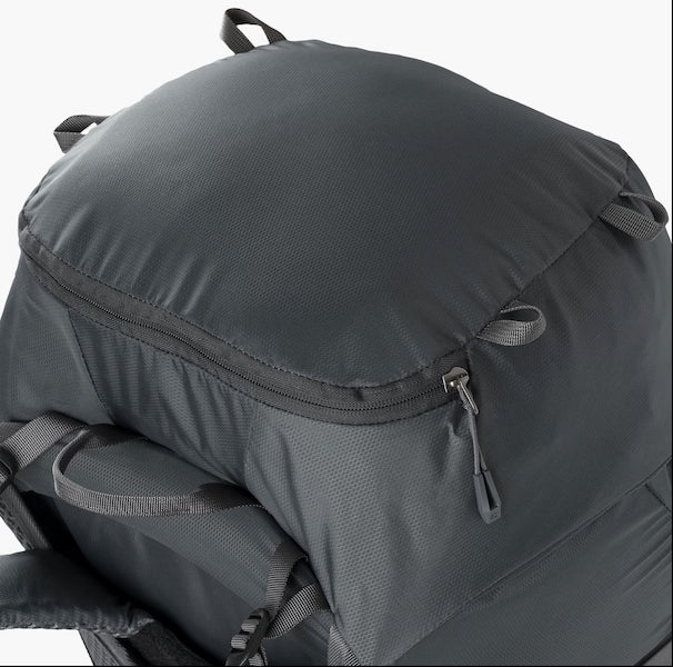 Close-up of a gray backpack with a zipper