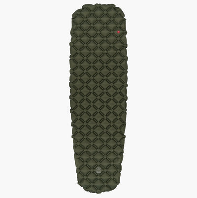 Green quilted sleeping pad on a white background