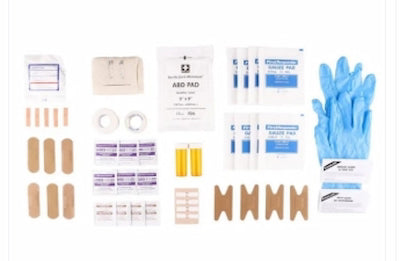 First aid kit with bandages, gauze, and gloves on a white background