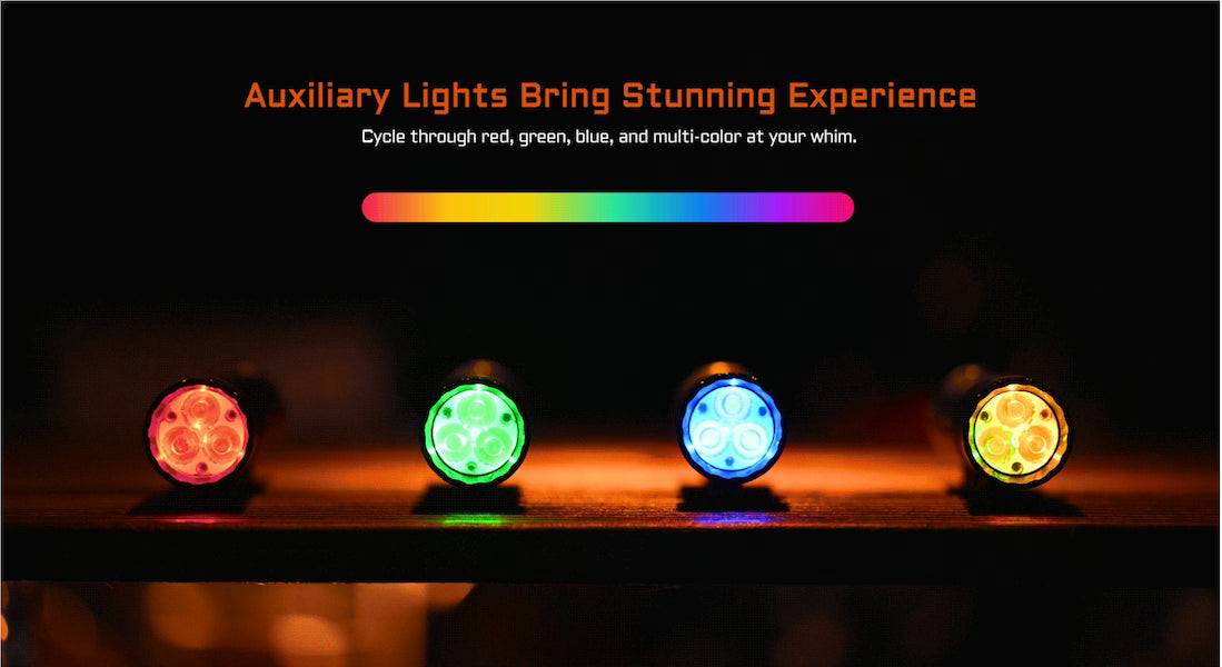 Four auxiliary lights displaying red, green, blue, and multicolor on a dark background with text about color options.