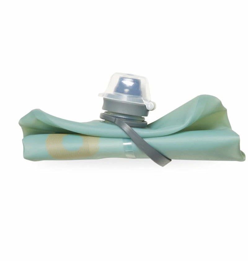 Collapsible water bottle with a light blue sleeve on a white background