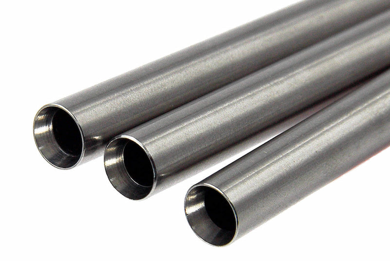 Three metallic pipes on a white background