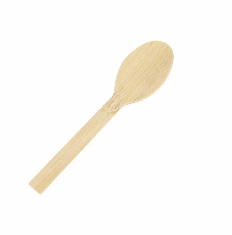Wooden spoon on a white background