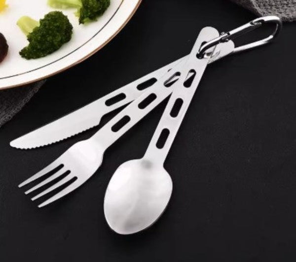 Set of silver cutlery with a carabiner on a black surface