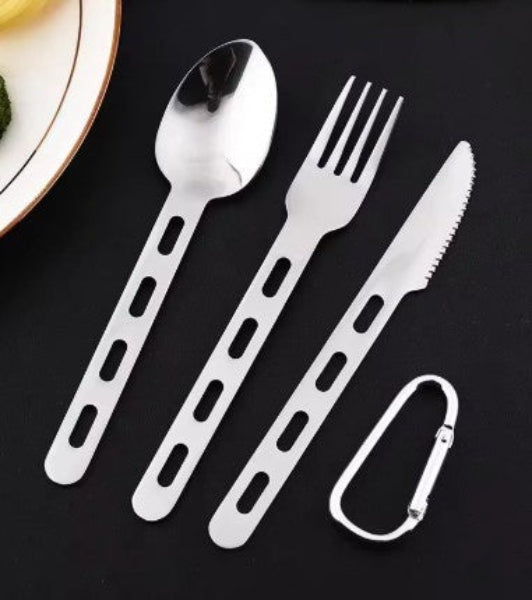 Stainless steel cutlery set with a carabiner on a black background