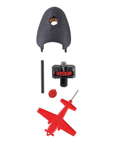 Set of mechanical components including a black rubber gasket, red tool, and other parts on a white background