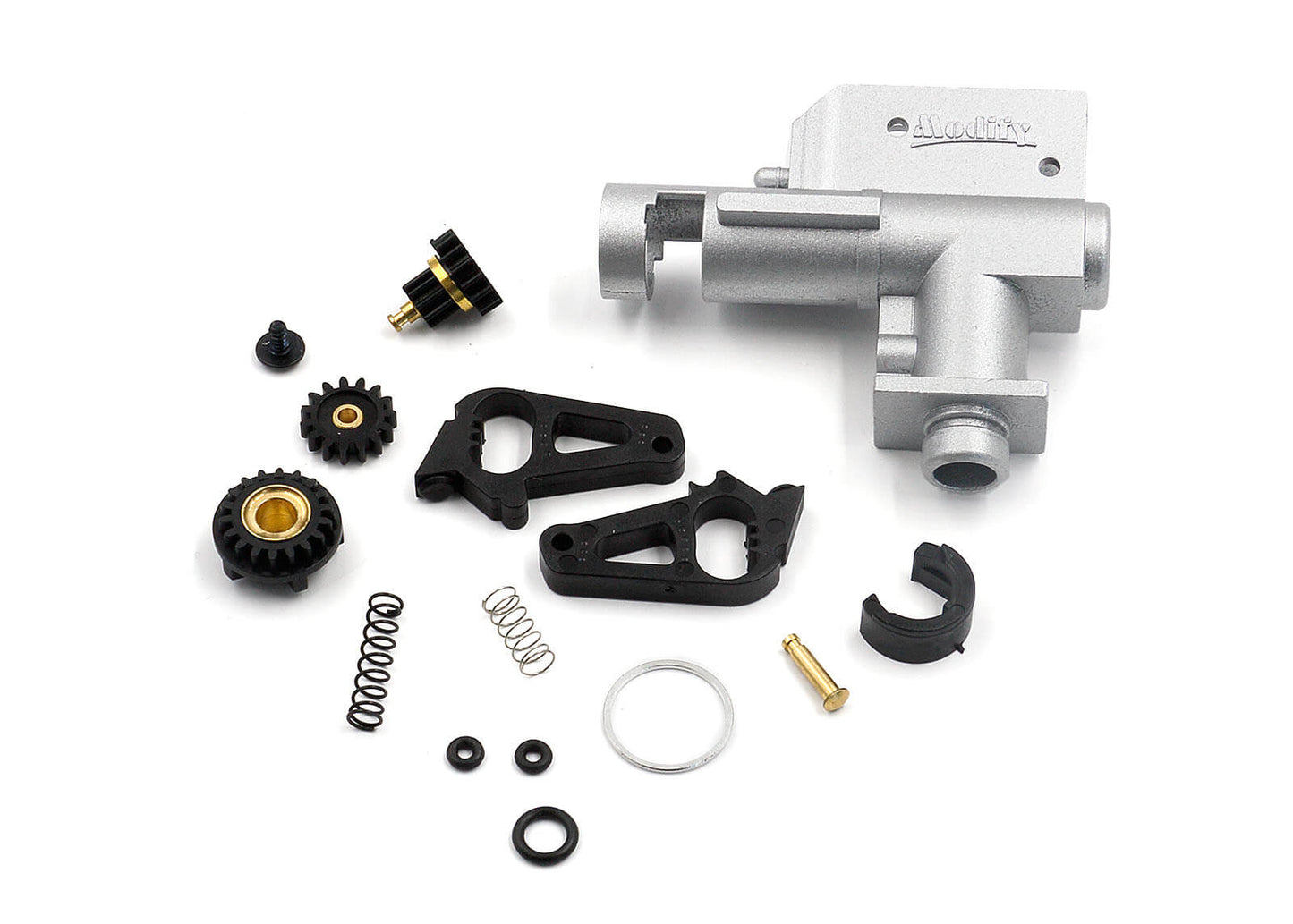 An image showing the components of the Modify Accurate Metal Hop Up Chamber, including metal parts, adjustment gears, and rubber O-rings, primarily in silver, black, and gold colors.