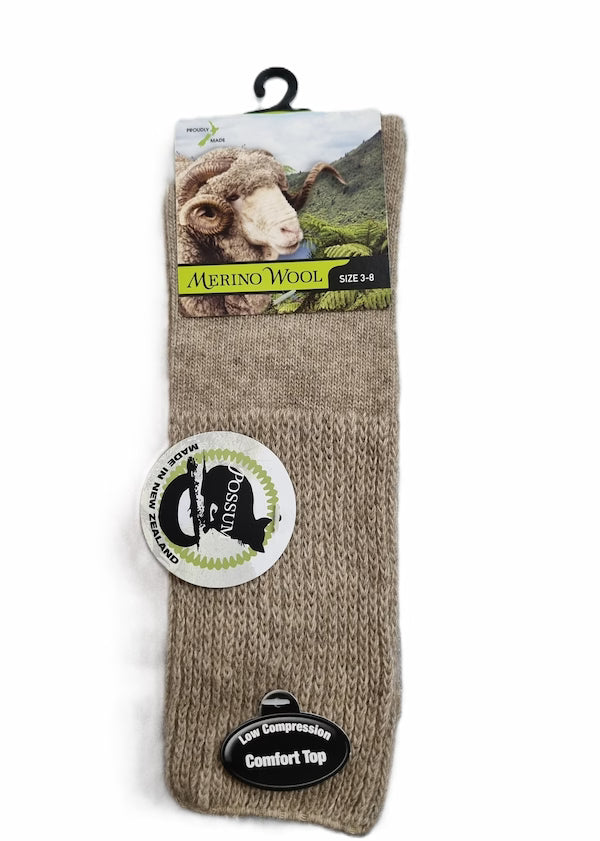 Brown sock with a label on a white background