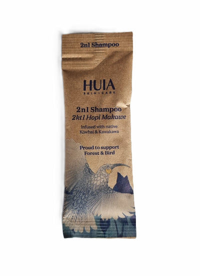 HUIA skincare 2in1 Shampoo package on a white background