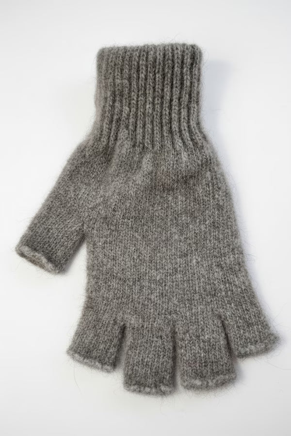 Gray knitted fingerless glove on a white background