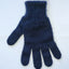 Blue knitted glove on a white background