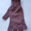 Purple fingerless glove on a white background