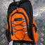 Orange and black backpack on a metallic surface