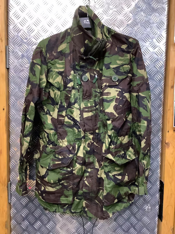 Camouflage jacket on a metal surface