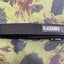 Black belt with 'Blackhawk!' logo on a camouflage-patterned surface