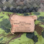 Vintage military dressing pad on a camouflage surface