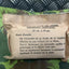 Military bandage package with instructions on a camouflage background