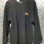A black Ironbark Pure New Zealand Wool Fisherknit Rib Crew Neck Jersey.