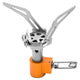 Portable camping stove with orange base and silver top on a white background