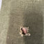 Textured fabric with a hole and decorative trim
