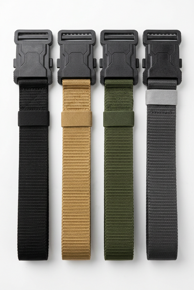 Four tactical web belt straps with black plastic quick-release buckles, shown in black, tan, olive green, and dark gray on a clean white background.