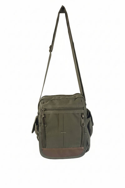An olive green nylon crossbody bag with a brown leather-like bottom panel and matching strap, shown against a plain white background.