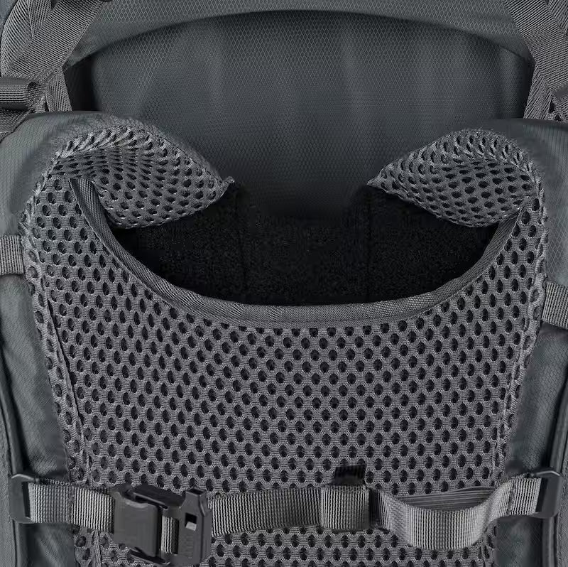 Close-up of a tactical vest with mesh back and straps.