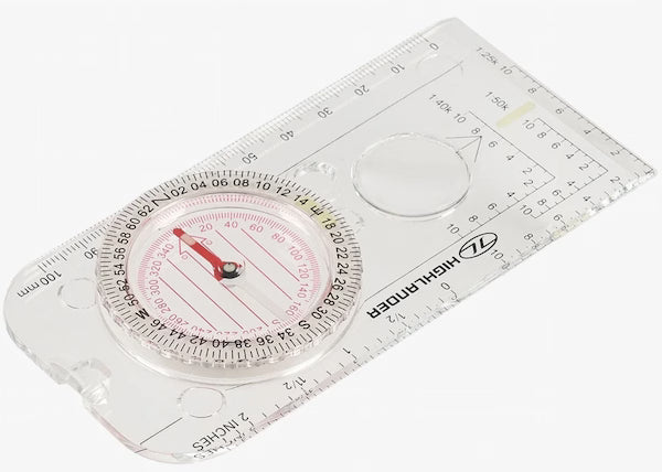 Compass with clear plastic casing on a white background
