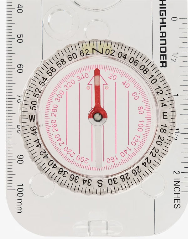 Compass with measurement scale on a white background