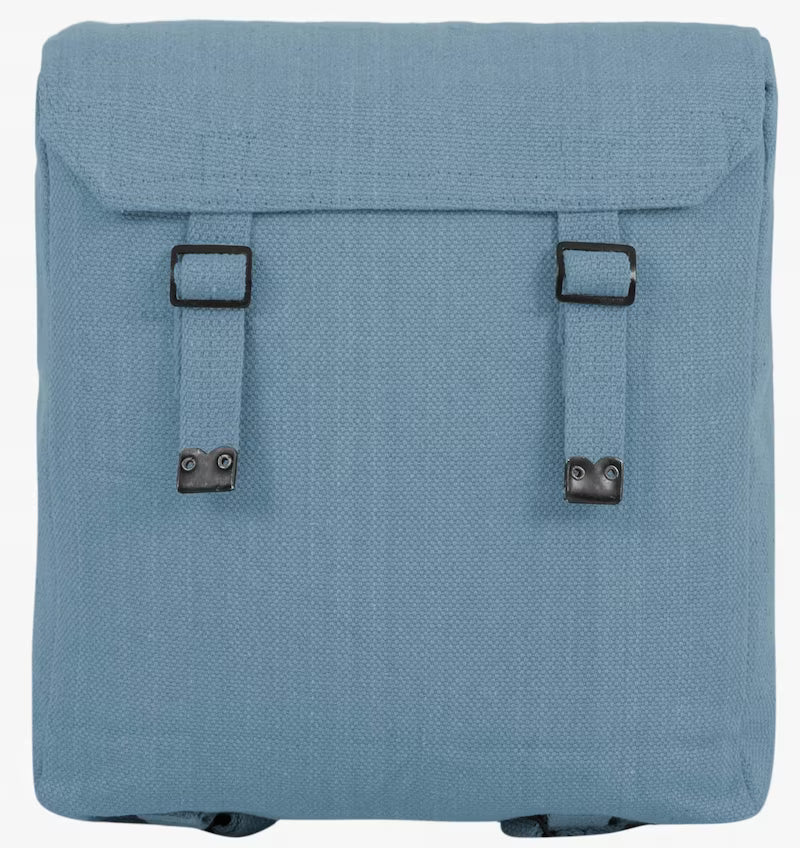 Blue backpack with black straps on a white background