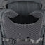 Close-up of a tactical backpack with mesh padding and straps.