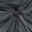 Close-up of a drawstring on a dark gray bag