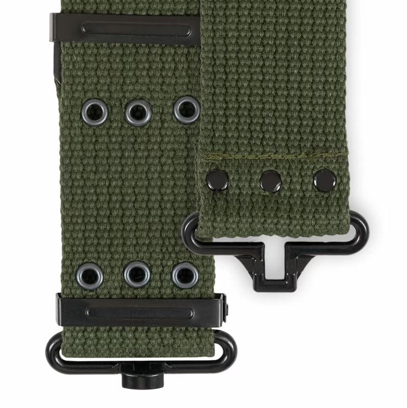 Green tactical strap with black hardware on a white background