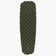 Green quilted sleeping pad on a white background