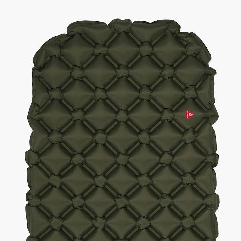 Green quilted sleeping pad with a brand logo on a white background