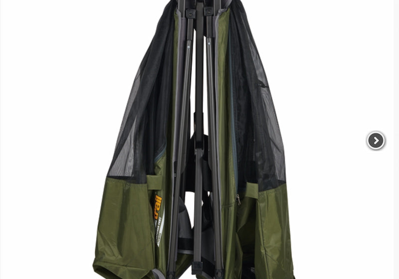 Green and black camping tent with poles on a white background