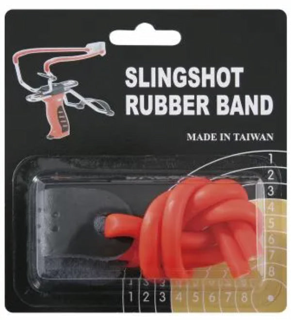 An orange-red slingshot rubber band packaged in a blister pack with a black backing card labeled 'SLINGSHOT RUBBER BAND' and 'MADE IN TAIWAN'.