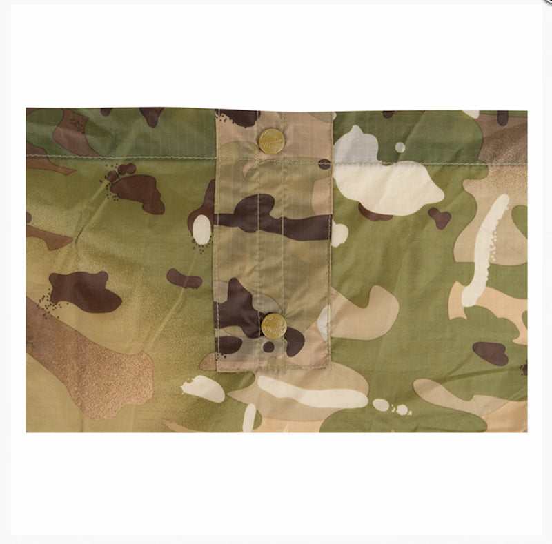 Camouflage fabric with a pattern of green, brown, and beige colors.