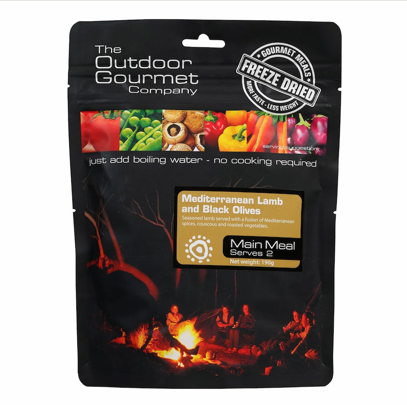 Packaged meal from The Outdoor Gourmet Company with a campfire scene on the packaging.