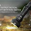 Tactical flashlight with dual switch on a natural background