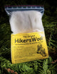 Packaged HikersWool on a green leafy background