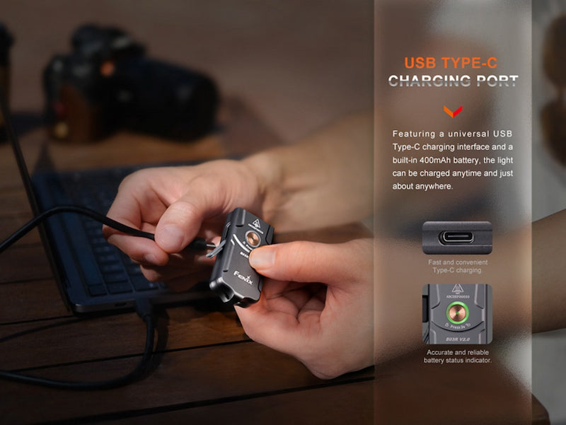 Person holding a device with USB Type-C charging port on a blurred background