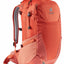 Orange backpack with visible brand logo on a white background